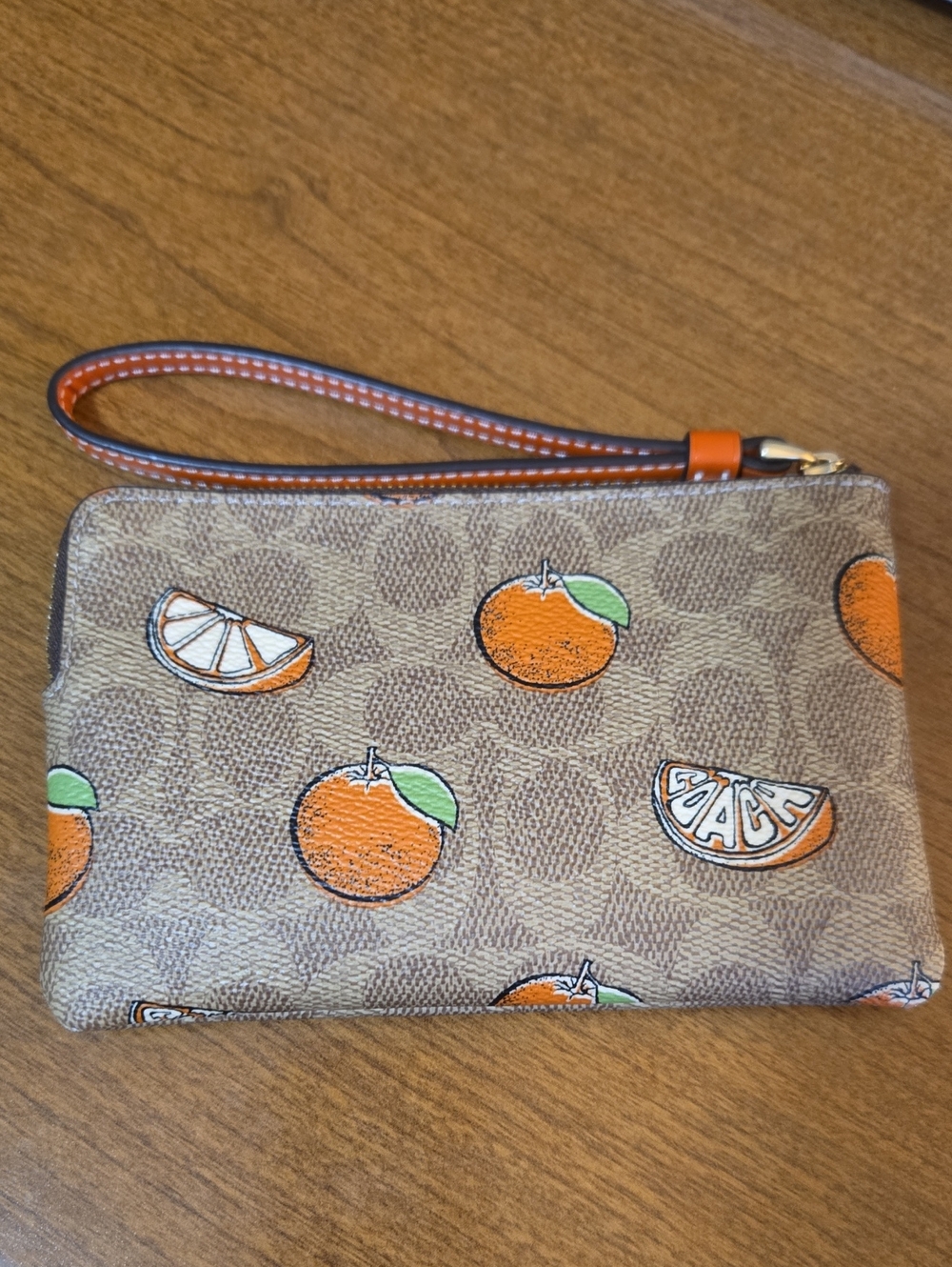 Coach Corner Zip Wristlet In Signature Canvas With Orange Print - Picture 5 of 7